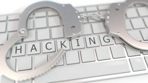 Handcuffs on keyboard with HACKING text on keys. Computer crime related イラスト素材