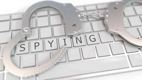 Handcuffs on keyboard with SPYING text on keys. Computer crime related Stock Illustration