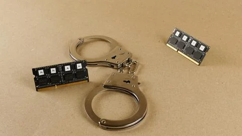Handcuffs restricting artificial intelligence technology and data control 写真素材
