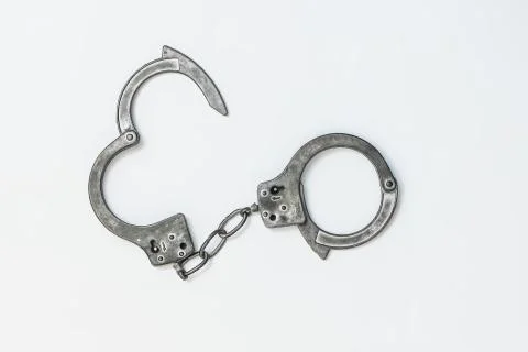 Handcuffs on white background isolate Stock Photos