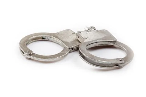 Handcuffs on white background Stock Photos