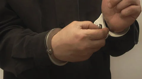 Handcuffs,not guilty Stock Footage 39154681