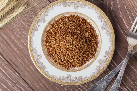 Handful of buckwheat Фото