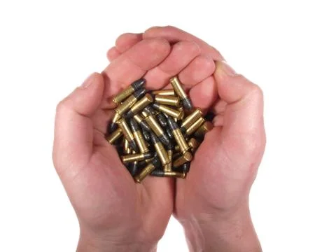 Handful of bullets isolated on white. Stock Photos