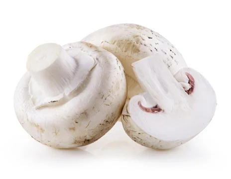 Handful of champignons Stock Photos