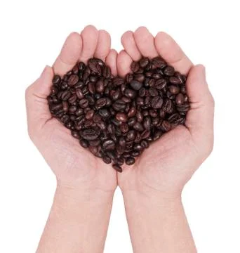 Handful of coffee beans Stock Photos