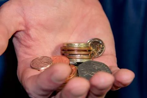 Handful of Coins Stock Photos