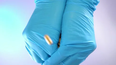 A handful of different pills scattered on a transparent surface. Stock Footage 170441601