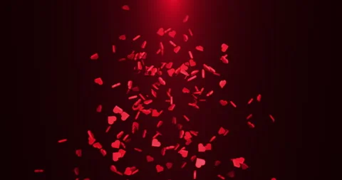 A handful of falling red hearts on a red background Stock Footage 257809202