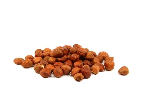 Handful hazelnuts isolated on the white background. Stock Photos