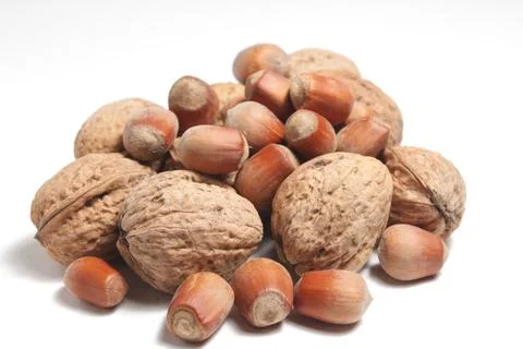 A handful of nuts on a white background Stock Photos