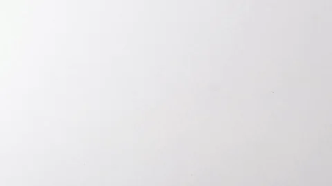 Handful of paperclips thrown onto a white surface. Stock Footage 117349925