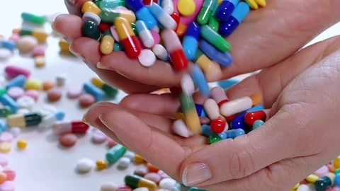 Handful of pills Stock Footage 88351960