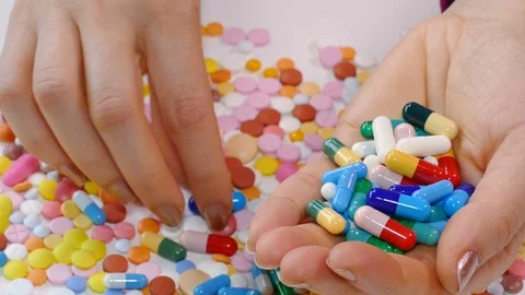 Handful of pills Video stock 88467197