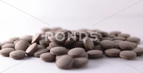 Handful of pills Stock Photos