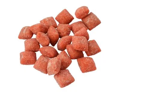 Handful of pink chocolates isolate on white background Stock Photos