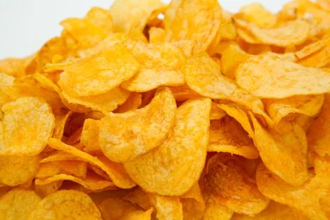 Handful of potato chips Stock Photos
