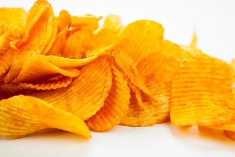 Handful of potato chips Stock Photos