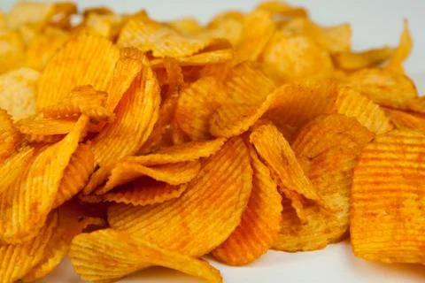 Handful of potato chips Stock-Fotos