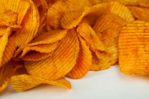 Handful of potato chips Stock Photos