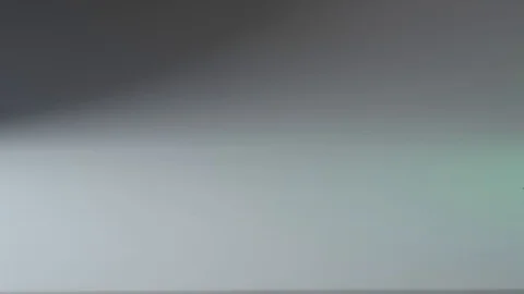 Handful of push pins roll in and out of frame Stock Footage 117350226