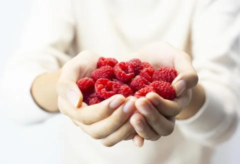 A handful of raspberry Stock Photos