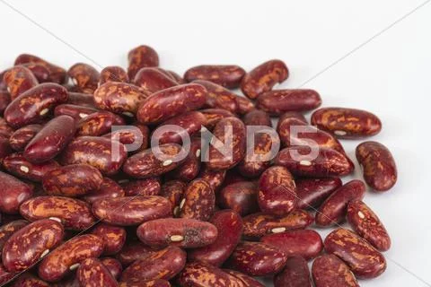 A handful of red beans. View from above. Isolated on white backg Stock Photos