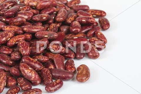 A handful of red beans. View from above. Isolated on white backg Stock Photos