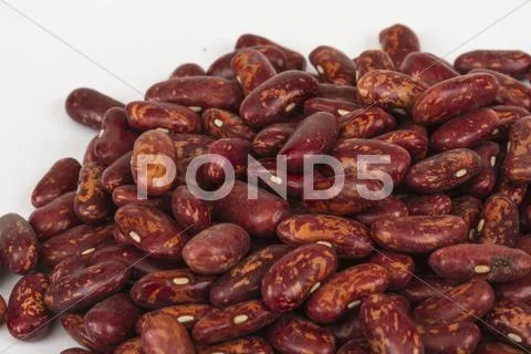 A handful of red beans. View from above. Isolated on white backg Stock Photos