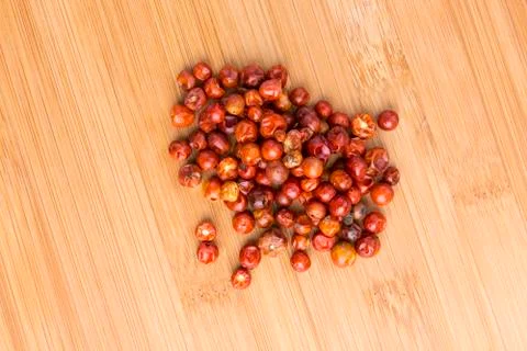 Handful of red spicy tiny round chile tepin peppers Stock Photos