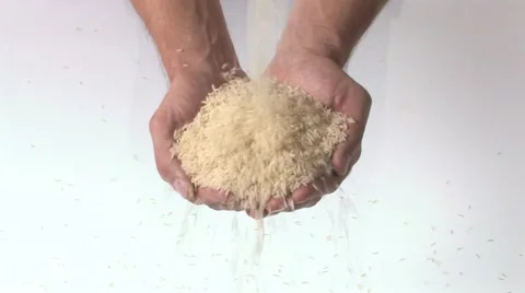 Handful of rice Stock Footage 11611442