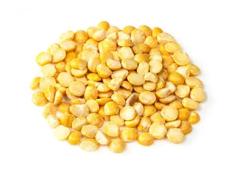 Handful of split yellow peas closeup on white Stock Photos