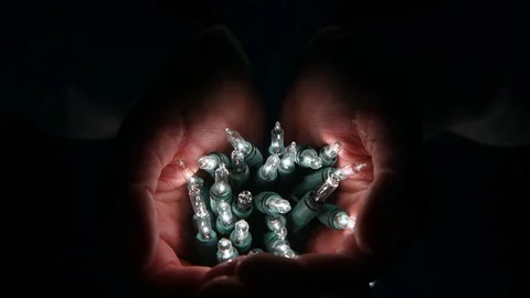 Handful of white blinking led lights isolated on black with copy space Video stock 106526600