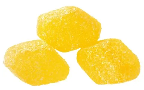 Handful of yellow candy Stock Photos