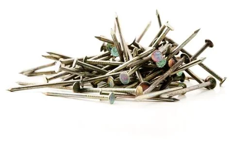 Handfull small nails Stock Photos