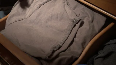 Handgun in drawer Stock Footage 47989149