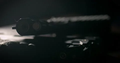 Handguns On A Table | Two Firearms Cinematic Slow Motion Stock Footage 229636570
