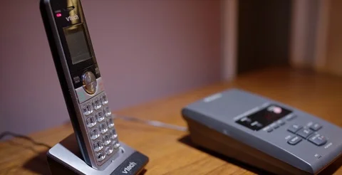 Handheld answering machine blinking Stock Footage 108515021