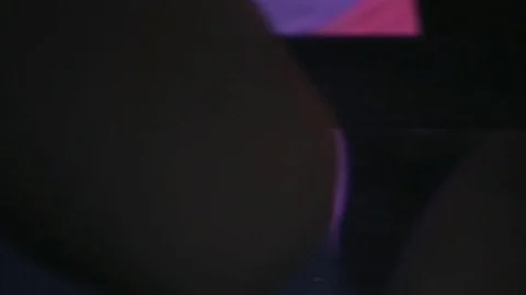 Handheld: Bartender Pours a Shot for Customer in a Moody LowLit Bar Stock Footage 79585066