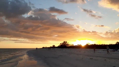Handheld Beach Sunset Stock Footage 149612649