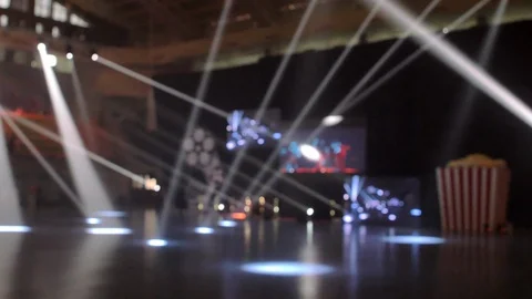 Handheld blur scene of white spotlight illuminate stadium during concert Video stock 113132865