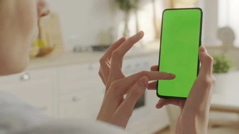 Handheld Camera: Back View of Blond Woman Holding Chroma Key Green Screen Видео 172017078