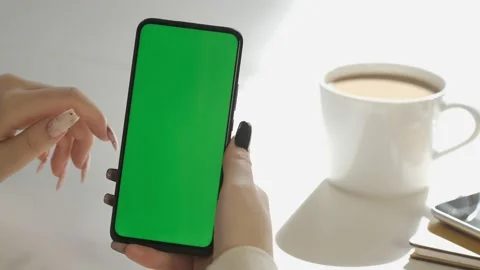 Handheld Camera: Back View of Brunette woan Holding Chroma Key Green Screen Stock Footage 166819152