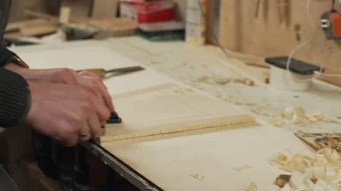 Handheld camera close up joiner work with jointer in his workshop Video stock 155618441