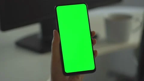Handheld Camera: Point of View of Woman at Room Sitting on a Chair Using Phone Stock Footage 138408671