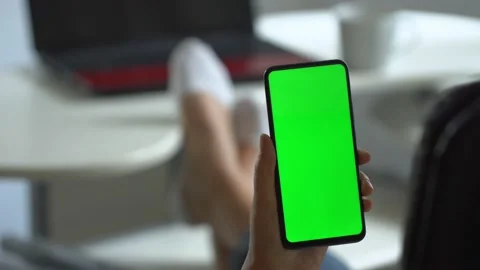 Handheld Camera: Point of View of Woman at Modern Room Sitting on a Chair Using Stock Footage 138847843