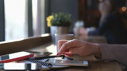 Handheld Camera: Point of View of Woman at a Chinese restaurant Sitting on a Stock Footage 219242492
