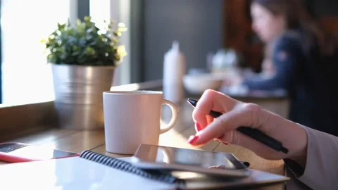 Handheld Camera: Point of View of Woman at a Chinese restaurant Sitting on a Stock Footage 219659949