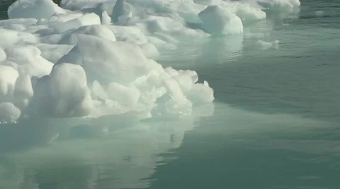 Handheld close up of ice floating in green arctic waters Greenland Stock Footage 59997553