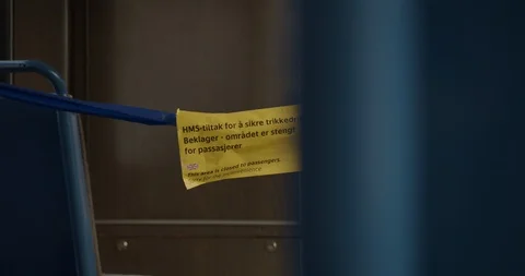 Handheld close-up shot inside train with warning to keep away from driver, Video stock 128722932